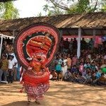 'People watching theyyam performance".