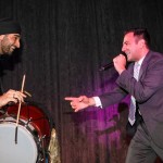 Bhangra, Bikram Singh, performs at the event with a dhol player