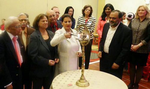 Amdex Corporation President and CEO Devinder Kaur Singh lighting the lamp at the 2017 NFIA Empowering Women and Girls Conference held at the Marriott hotel in Tysons Corner, Virginia.