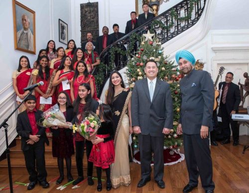 Indian Ambassador Navtej Sarna (front right) and US Under Secretary of Transportation for Policy Derek Kan (second from right) with singers of the Indian American Catholic Association Choir Ministry at the 2017 Christmas celebration held at the Embassy of India in Washington.