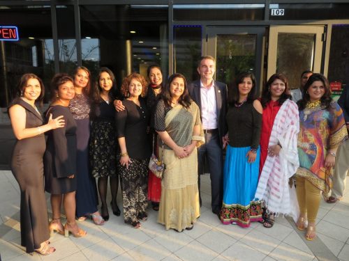 Virginia Governor Ralph Northam is flanked by Indian American female activists at an event celebrating Asian American and Pacific Islander Heritage Month, held in Tysons Corner on May 20, 2018 .