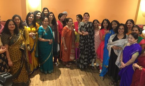 Kannada film star Bhavana Ramanna poses for a photo with guests at a reception in her honor at the Jewel of India restaurant in Silver Spring, MD, on September 28.