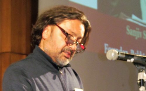 Sanjiv Saraf speaking at the Aligarh Alumni Association mushaira in Silver Spring, MD, on November 11, 2018.