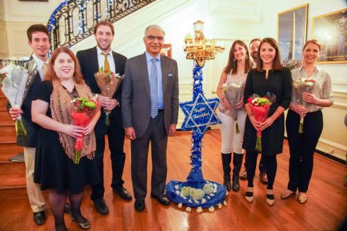 Deputy Chief of Mission Santosh Jha (fourth from left) with members of a Jewish young professionals group who rendered Hanukkah songs at the 16th annual celebration held at the Indian Chancery in Washington, DC. Photo credit: Embassy of India, Washington