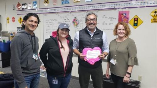 Rep. Ami Bera paying a Valentine's Day visit to a school in his district.