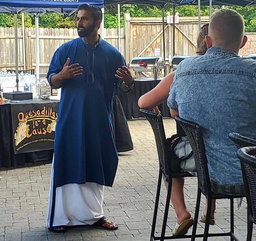 Wearing a ‘mundu,’ an Indian American activist sends a message to Trump over his ‘Go back’ remark Peter Jacob in mundu