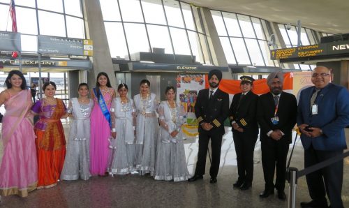 For the first time, Diwali was celebrated at the Washington Dulles International Airport. Seen from left to right are: Shweta Misra, founder and director of Nrityaki Dance Academy, with her students; Air India flight crew; and personnel of the Metropolitan Washington Airports Authority.