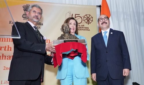 House Speaker Nancy Pelosi receiving a bust of Mahatma Gandhi from India's External Affairs Minister S. Jaishankar