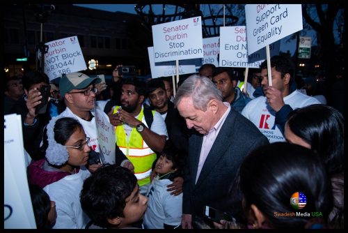 Hundreds stuck in Green Card backlog stage protest in front of restaurant hosting Durbin event Indians stuck in Green Card backlog staging protest in front of a restaurant that hosted a fundraiser for Sen. Dick Durbin.