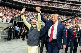 President Donald Trump holds hands with Prime Minister Narendra Modi as they take a surprise walk together around the NRG Stadium in Houston, Texas. Official White House Photo by Shealah Craighead