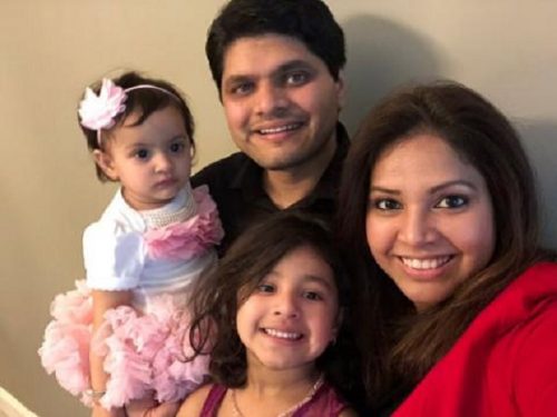 Poorva Dixit, with her husband, Kaustubh Talathi, and their two children. Dixit is one of the more than thousand nonimmigrant visa holders currently stranded in India.