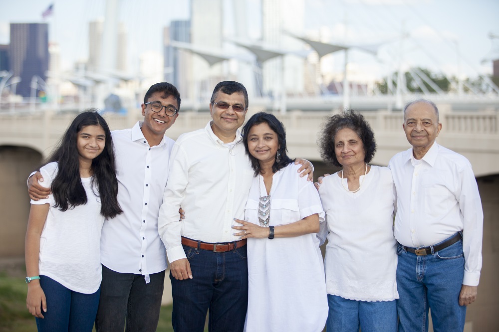 Vishakha Sheth (second from right), with her husband, Prakash, (right), their daughter Sejal Desai (third from right), son-in-law and grandchildren.
