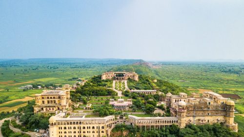 An aerial view of Tijara Fort-Palace and the breathtaking countryside