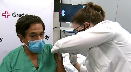 Dr. Sanjay Gupta receiving the Covid-19 vaccine.