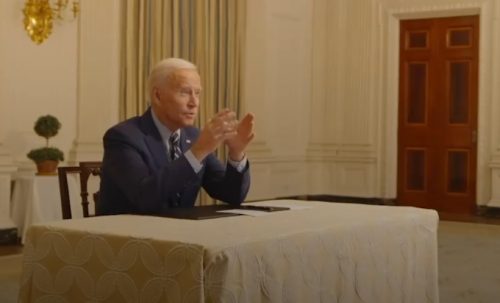 President Joe Biden talking to Neal and Samir Idnani, owners of â€œNaanStop,â€ an Indian restaurant in Atlanta, hit hard by the coronavirus pandemic.