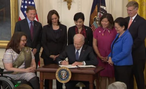 Biden signs legislation to combat hate crime against Asian Americans President Joe Biden signing the COVID-19 Hate Crimes Act at the White House on May 20, 2021.