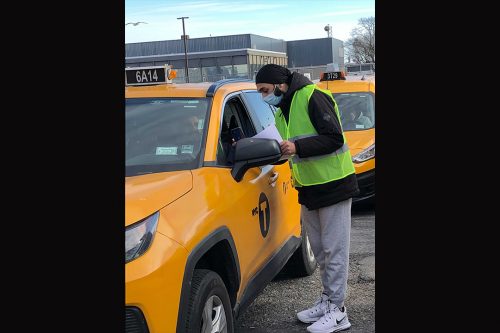 Activists distribute helpline resources to New York taxi drivers