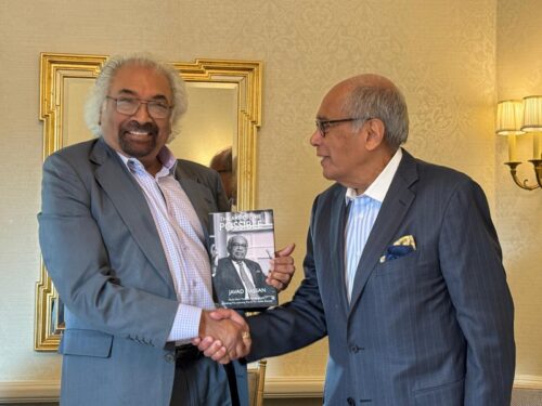 Telecom pioneer Sam Pitroda (left) unveiling the autobiography of Indian American technology entrepreneur Javad K. Hassan (right) at the Willard Hotel in Washington, DC