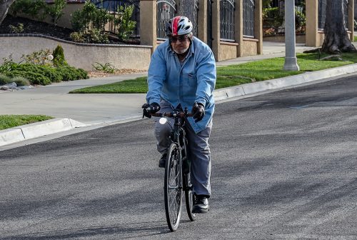 Indian American inventor Rafe Husain riding Calibike