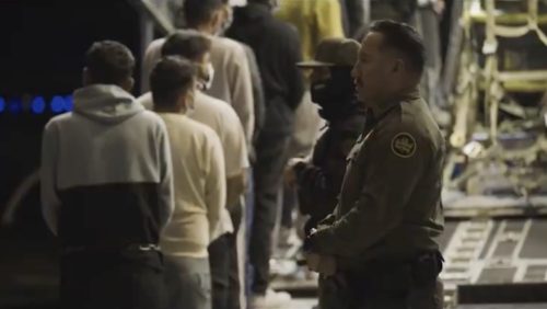 A video posted by U.S. Border Patrol Chief Michael W. Banks shows undocumented Indian immigrants, handcuffed and shackled, being escorted onto a deportation flight to India.