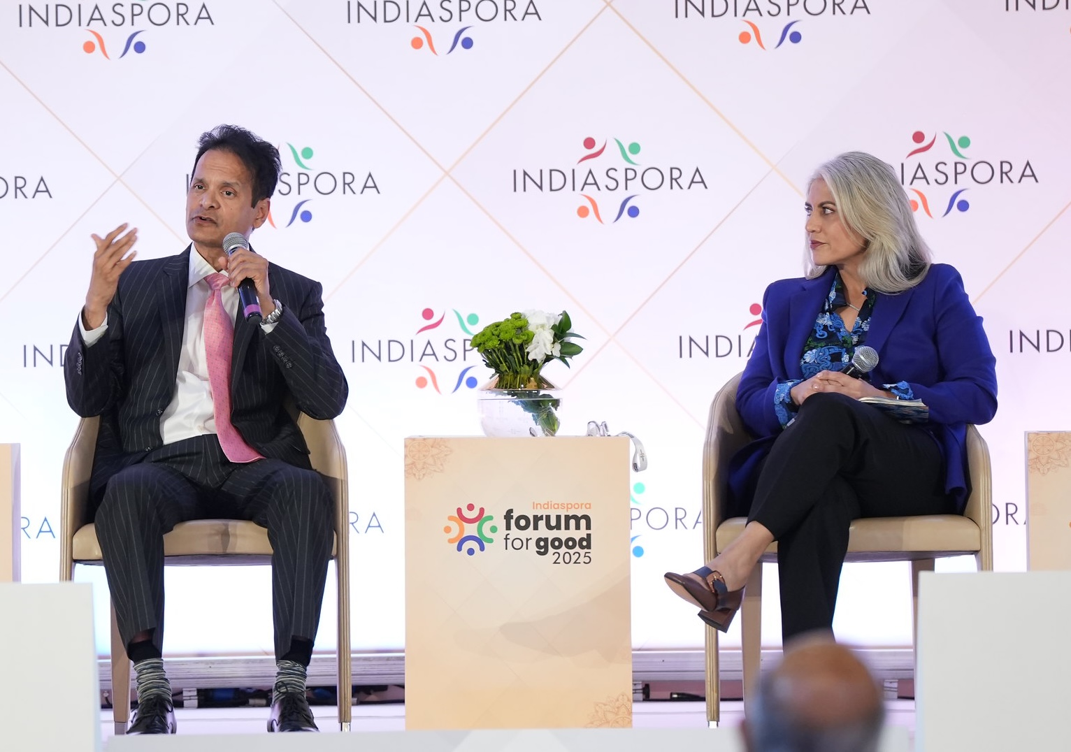 Himanshu Shah, Founder and Executive Chairman of Marius Pharmaceuticals, addresses a plenary session at the Indiaspora Forum for Good on January 24, 2025. Also present is Moira Shourie, Executive Director of Zócalo Public Square.