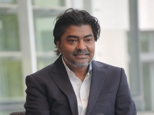 Alt text: Sumit Bhatnagar, CEO of GreenBrilliance, speaking at a panel event