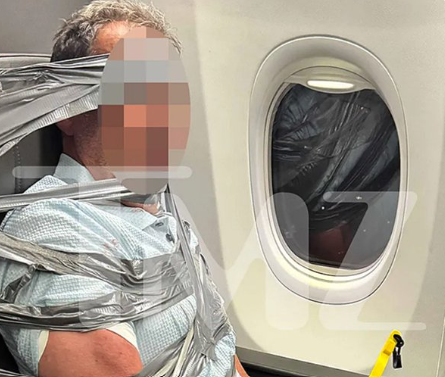 American Airlines passenger restrained with duct tape midair; Flight diverted