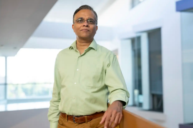 Immigration Interview Computer Jignesh Patel founding dean of Carnegie Mellon’s Miami campus